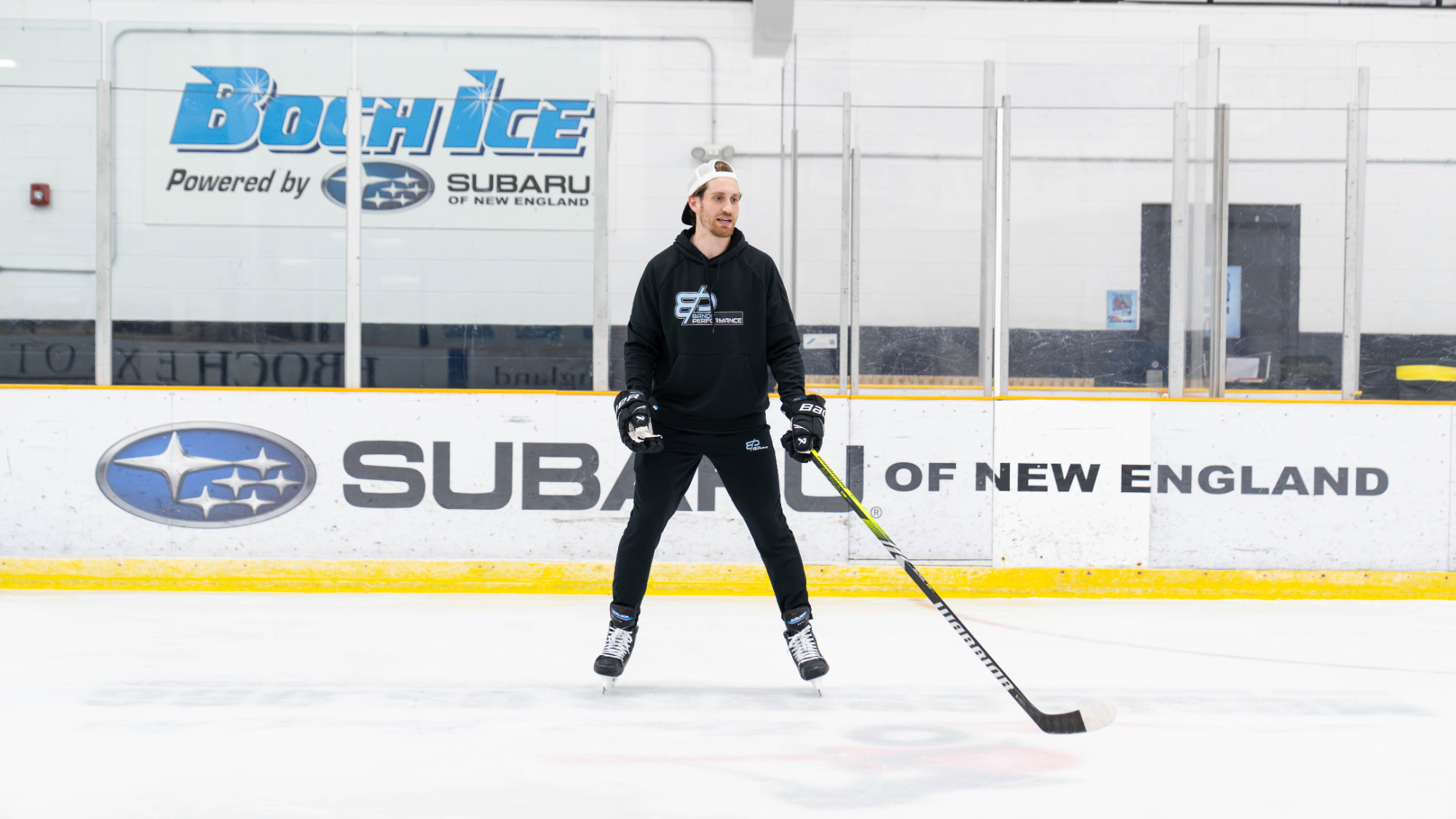Player working through a drill with a coach